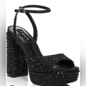 Aqua stuffed heels worn only once!